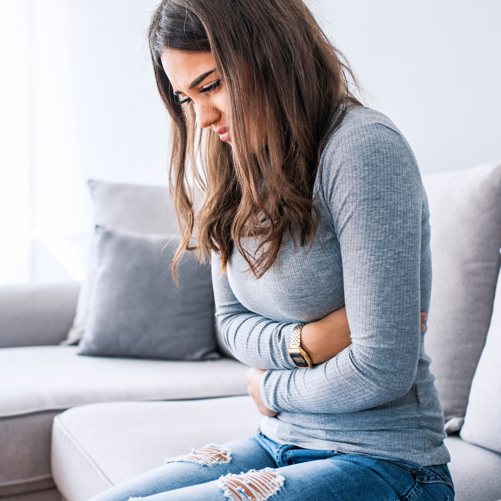 What are the symptoms of an unhealthy gut?